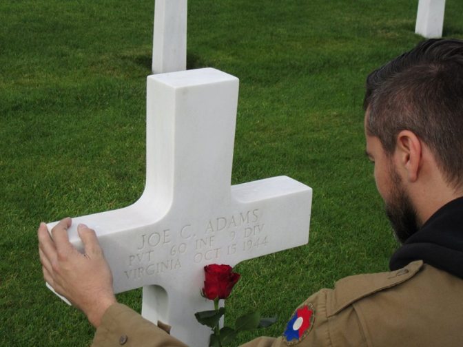Paying my respects to a fallen Ninth Division man at one of the American Cemeteries.