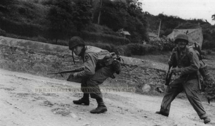 9th Infantry Division men run for cover in Normandy 1944