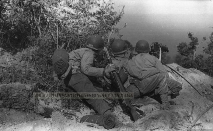 9th Infantry Division men on the lookout during a battle