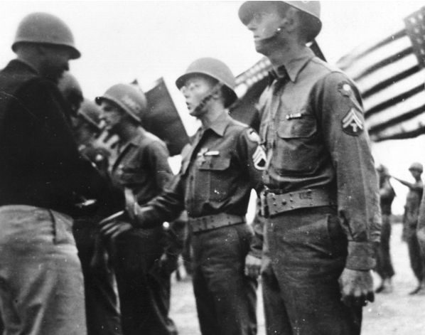 Charles Willsher receiving Distinguished Service Cross from General George S. Patton