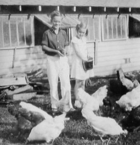 Bill and his sister Lois feed the Chicken