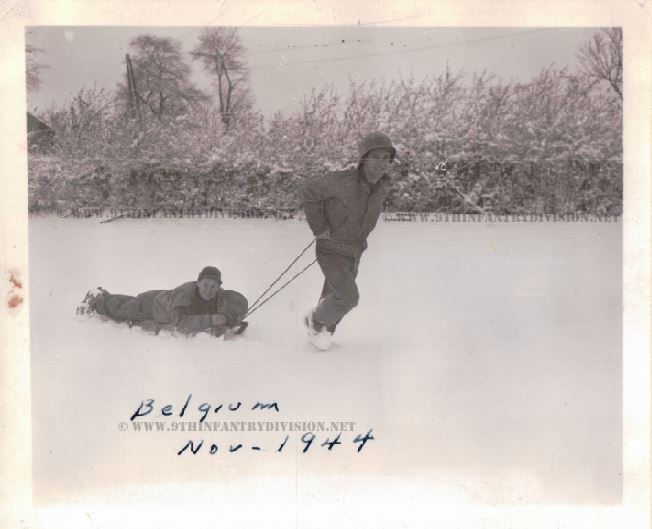 Sgt. Michael Puzak riding the sledge.