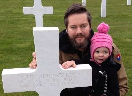 Yuri and daughter Nora at one of the adopted graves.