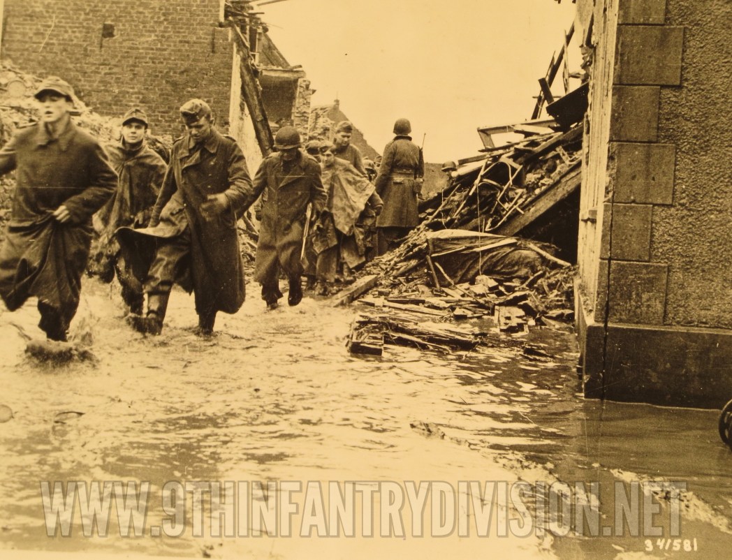 German prisoners walking on Kapellenstrasse, Jungersdorf.