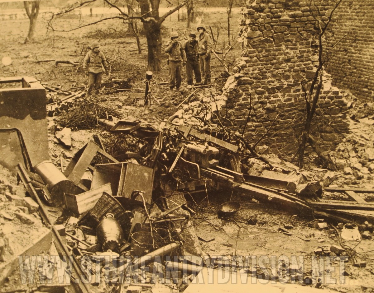 German Gun and mortar at the edge of the village.