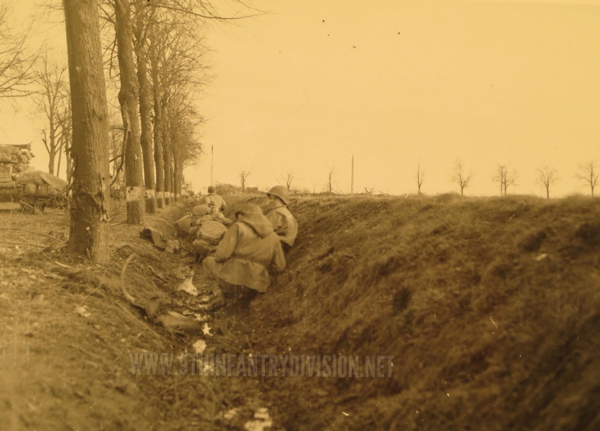 60th Infantry Regiment men take cover in a ditch near Obergeich.