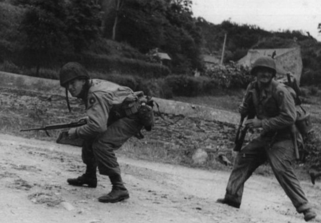 9th Infantry Division men moving forward.