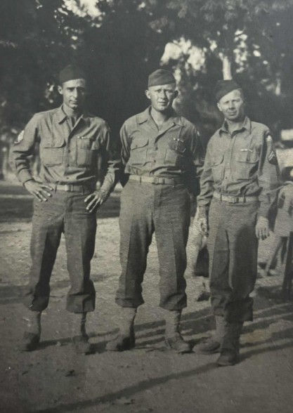 October 1943, Sicily. Willis stands on the right.